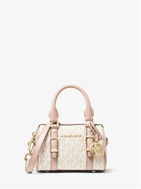 michael kors micro duffle|michael kors pink suitcase.